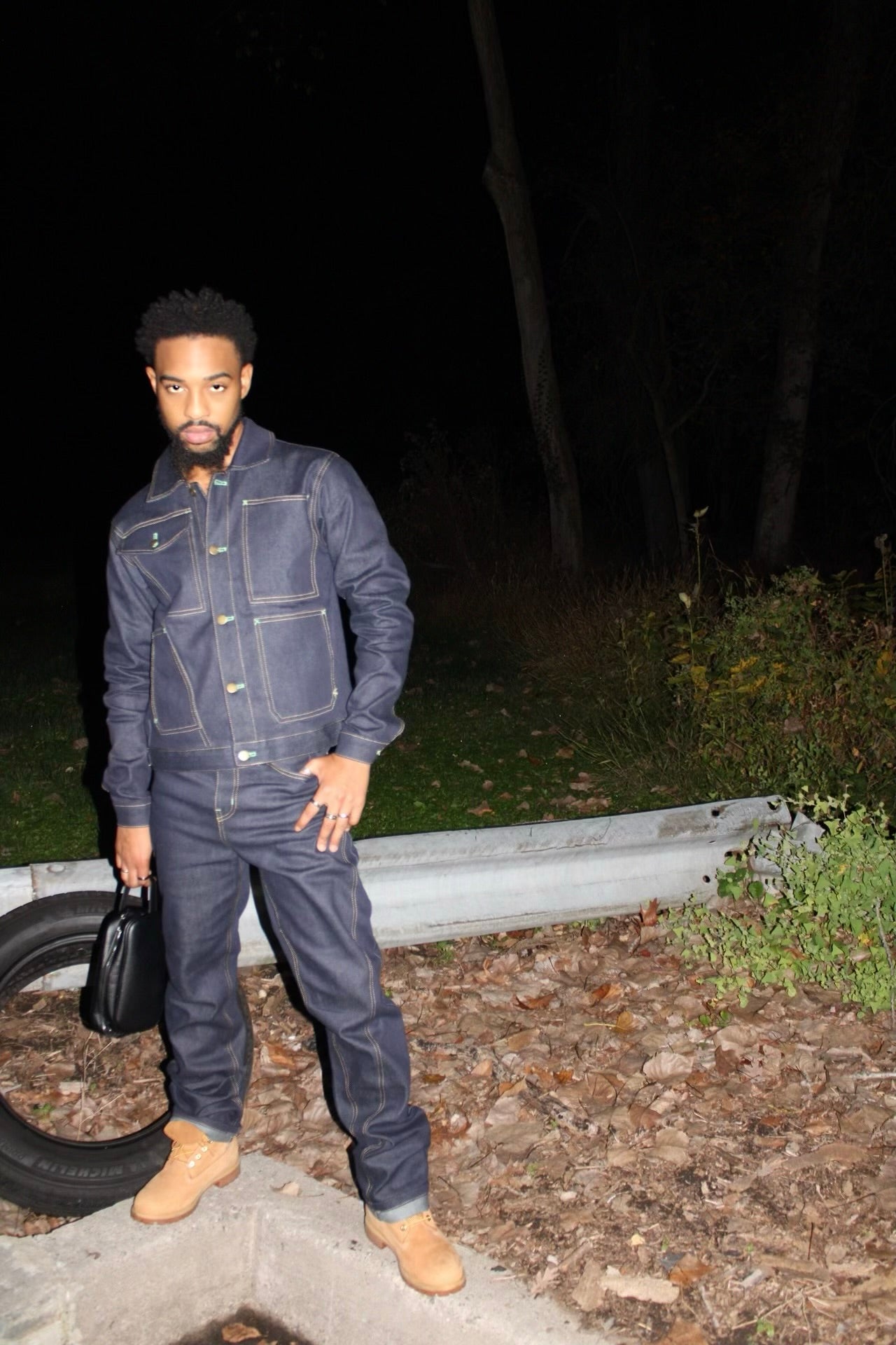 MASNUAT denim set photographed outdoors at night