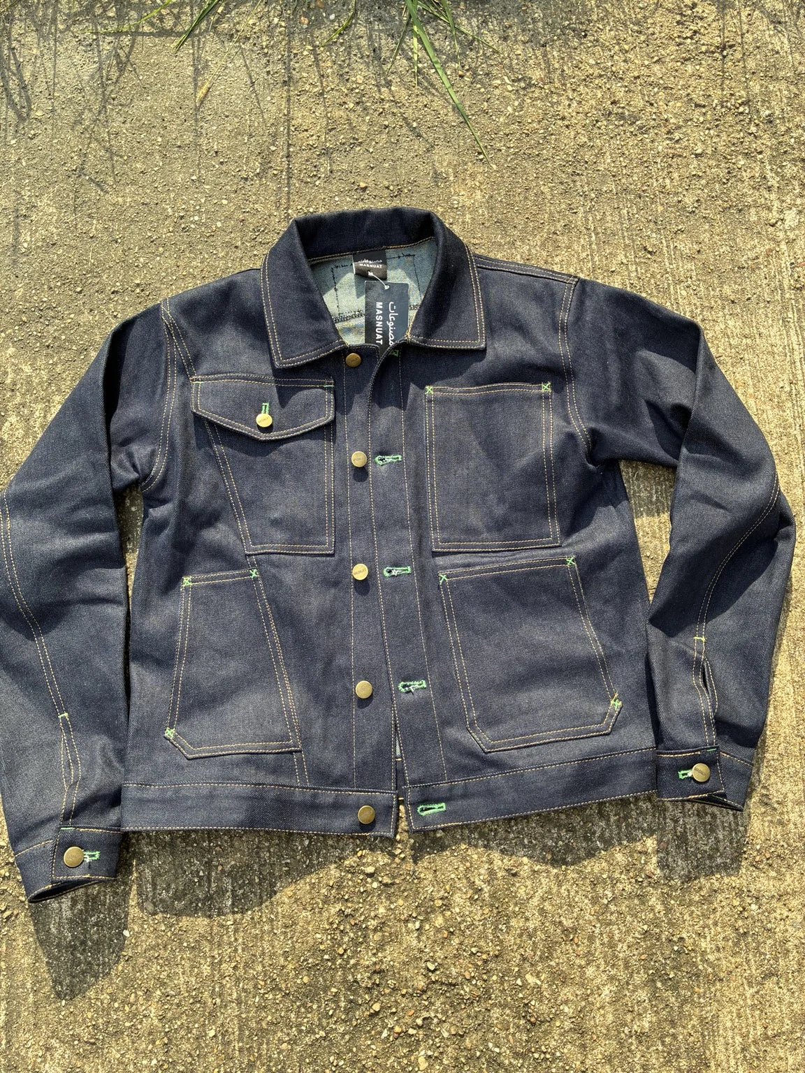 MASNUAT selvage denim jacket with brass hardware and green bar tacks