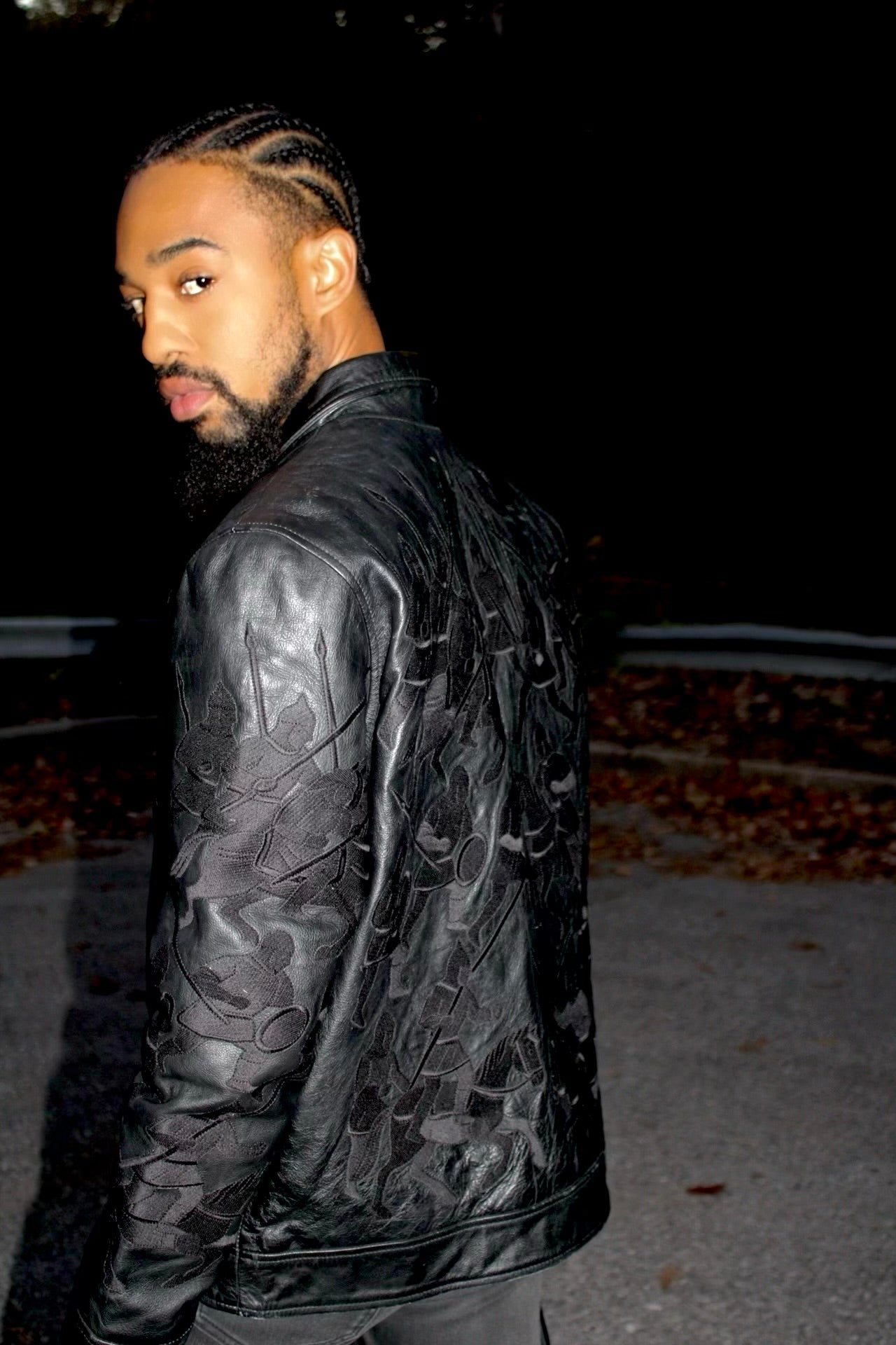 Nighttime campaign portrait in black leather