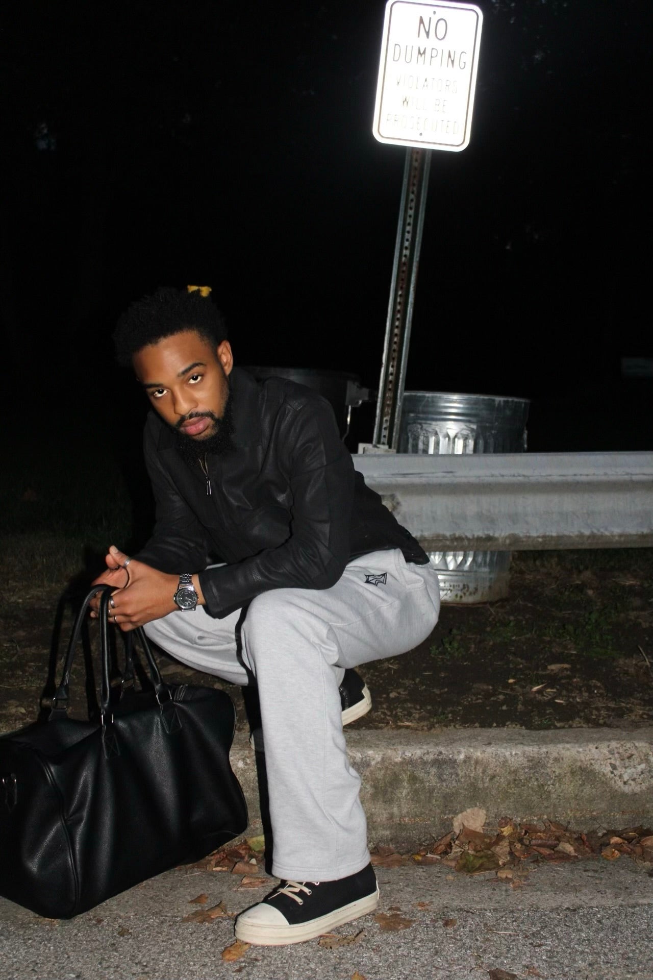 Grey MASNUAT sweatpants in a seated campaign look
